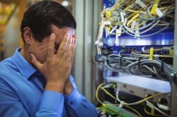 Technician getting stressed over server maintenance in server room-027635-edited.jpeg